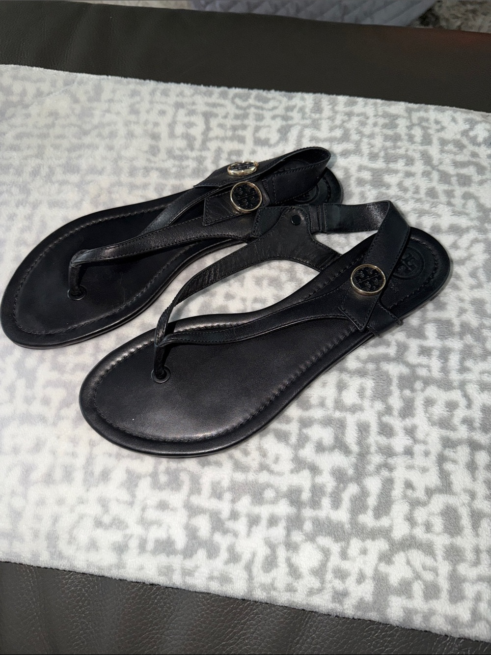 Tory Burch Black Leather Minnie travel sandal with gold accent